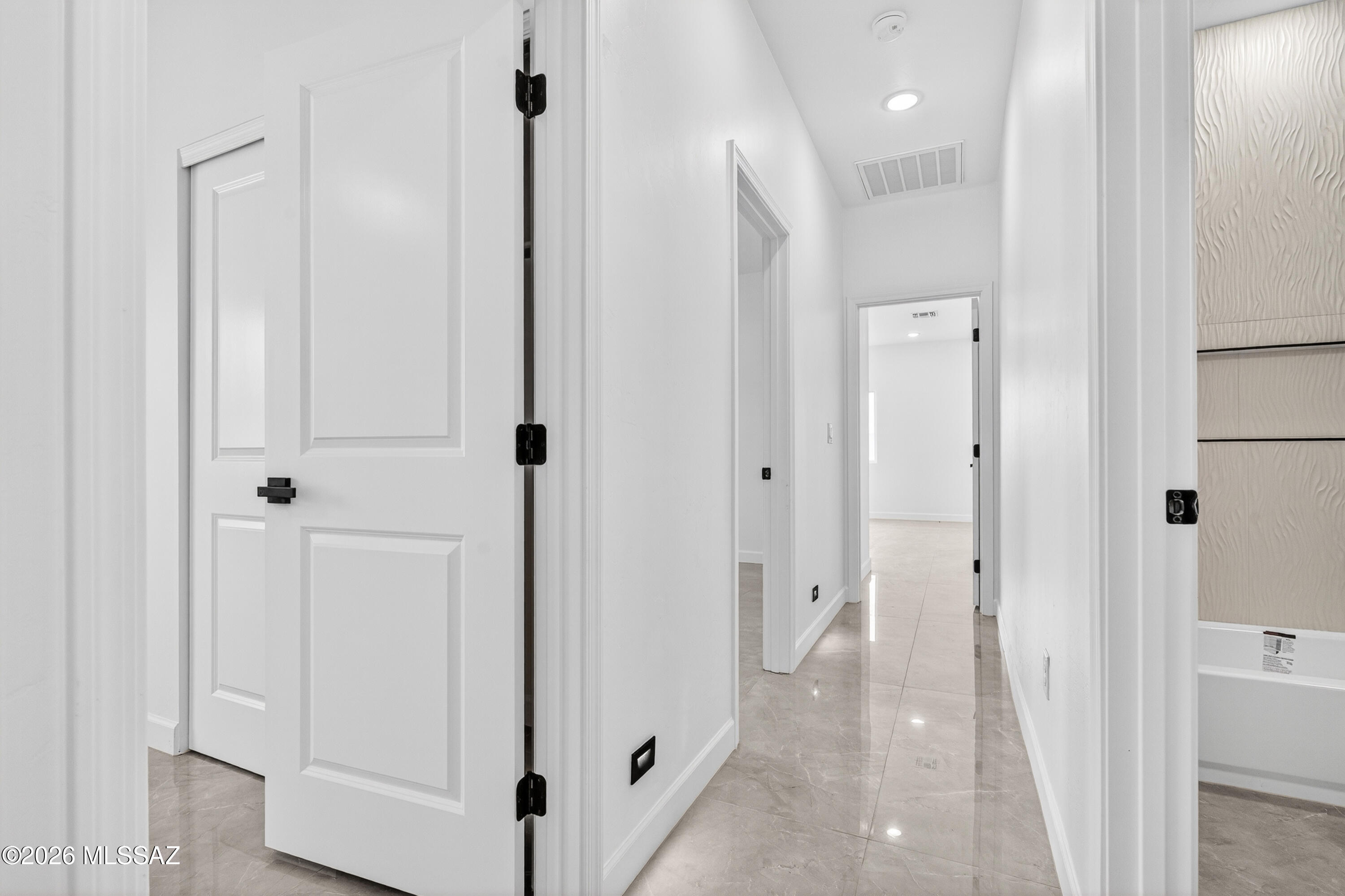 1834 Circulo Glorieta Rio Rico, AZ 85648 - Photo 21 of 35 a view of a hallway with white doors