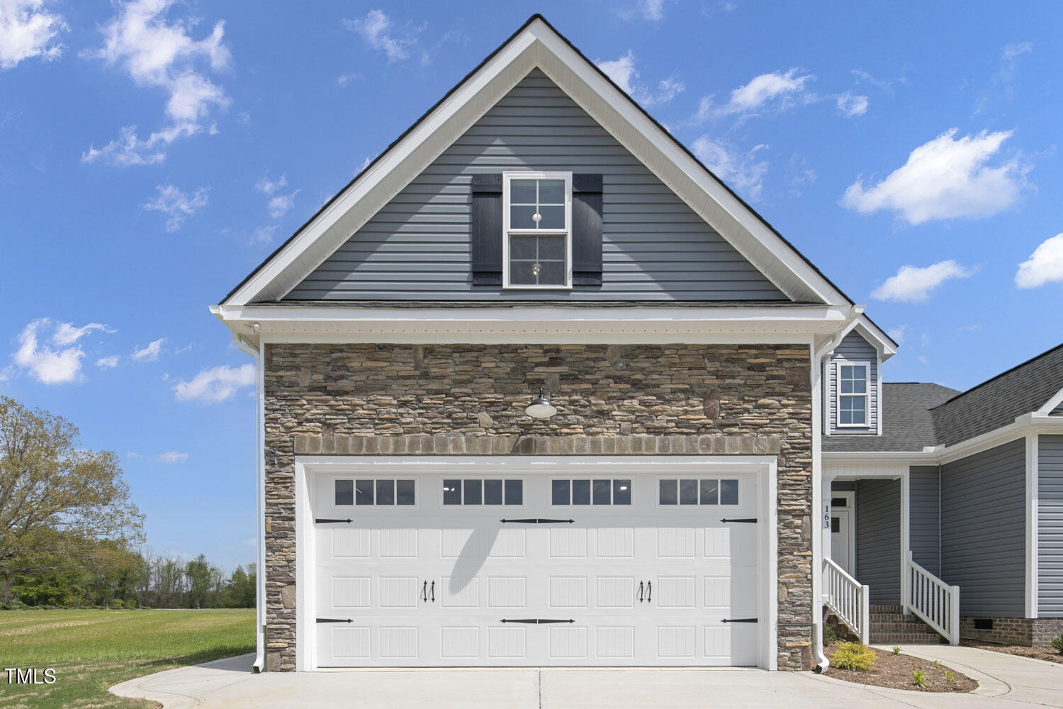 163 South Harper Faith Way Benson, NC 27504 - Photo 5 of 49 a view of a house with a yard