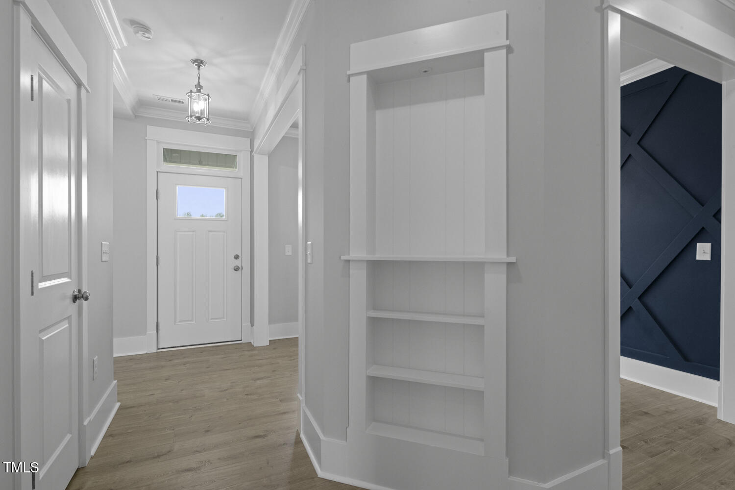 163 South Harper Faith Way Benson, NC 27504 - Photo 7 of 49 a view of a hallway with wooden shelves