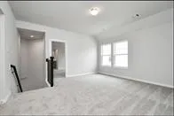 a view of a hallway with a white walls