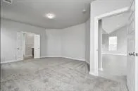 a view of a hallway with stairs