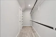 a bathroom with a granite countertop sink mirror and double