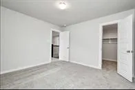 a view of a swimming pool with a yard