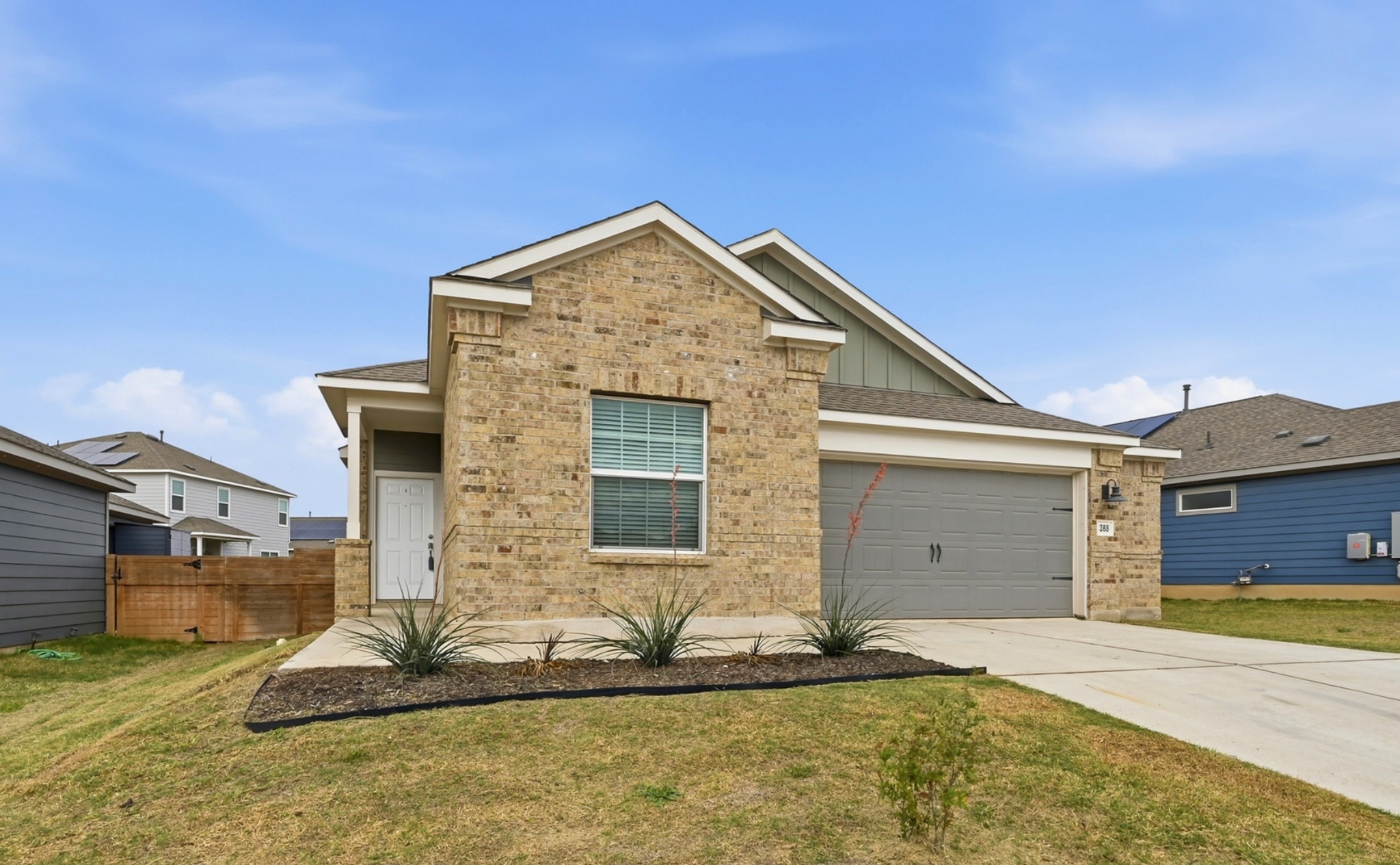 388 Barcelona Kyle, TX 78640 - Photo 1 of 26 a front view of a house with a yard