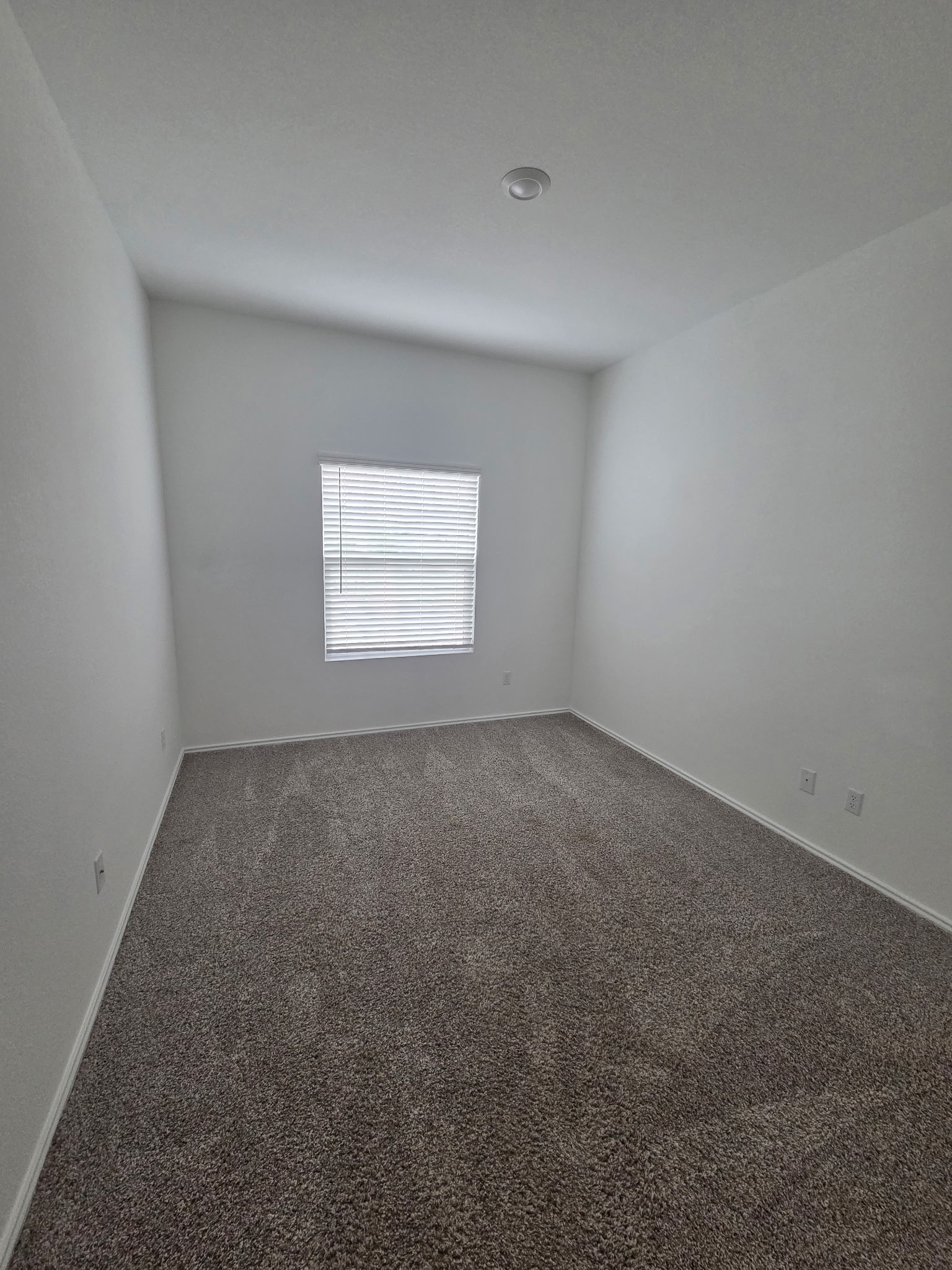388 Barcelona Kyle, TX 78640 - Photo 14 of 26 an empty room with a window