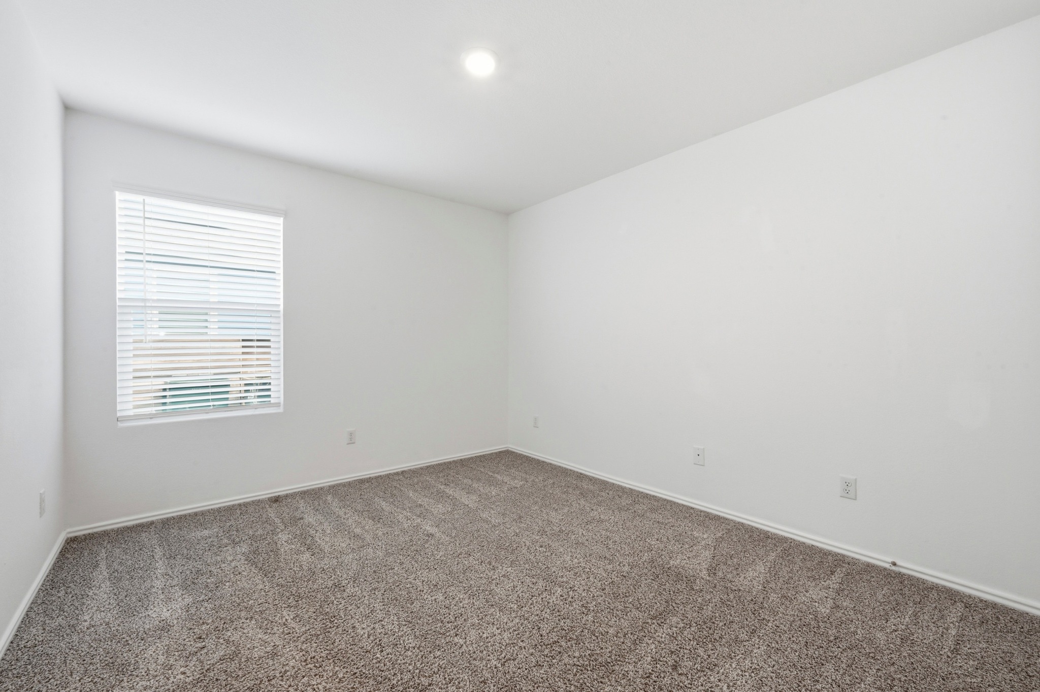 388 Barcelona Kyle, TX 78640 - Photo 18 of 26 an empty room with a window