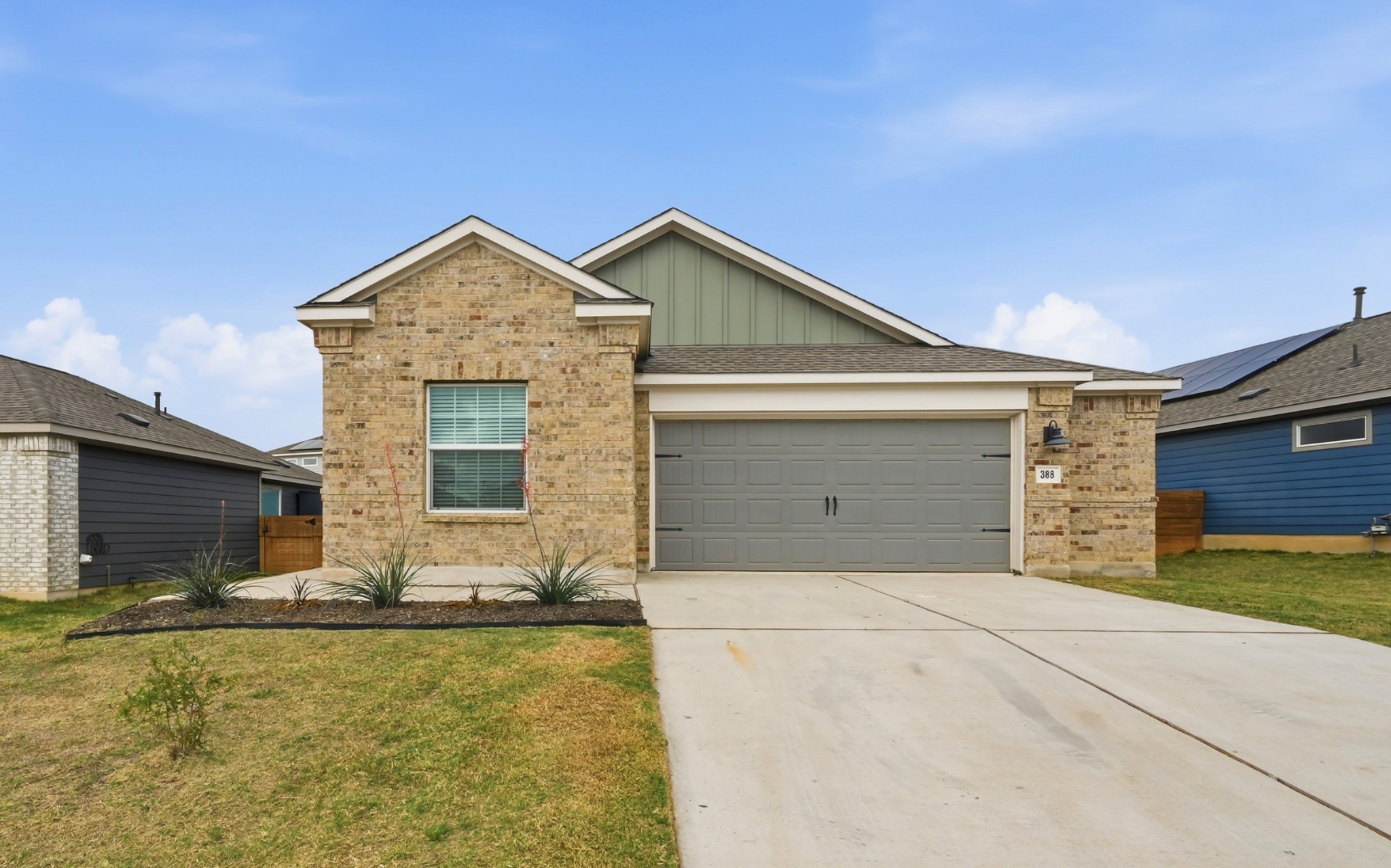 388 Barcelona Kyle, TX 78640 - Photo 2 of 26 a front view of house with yard