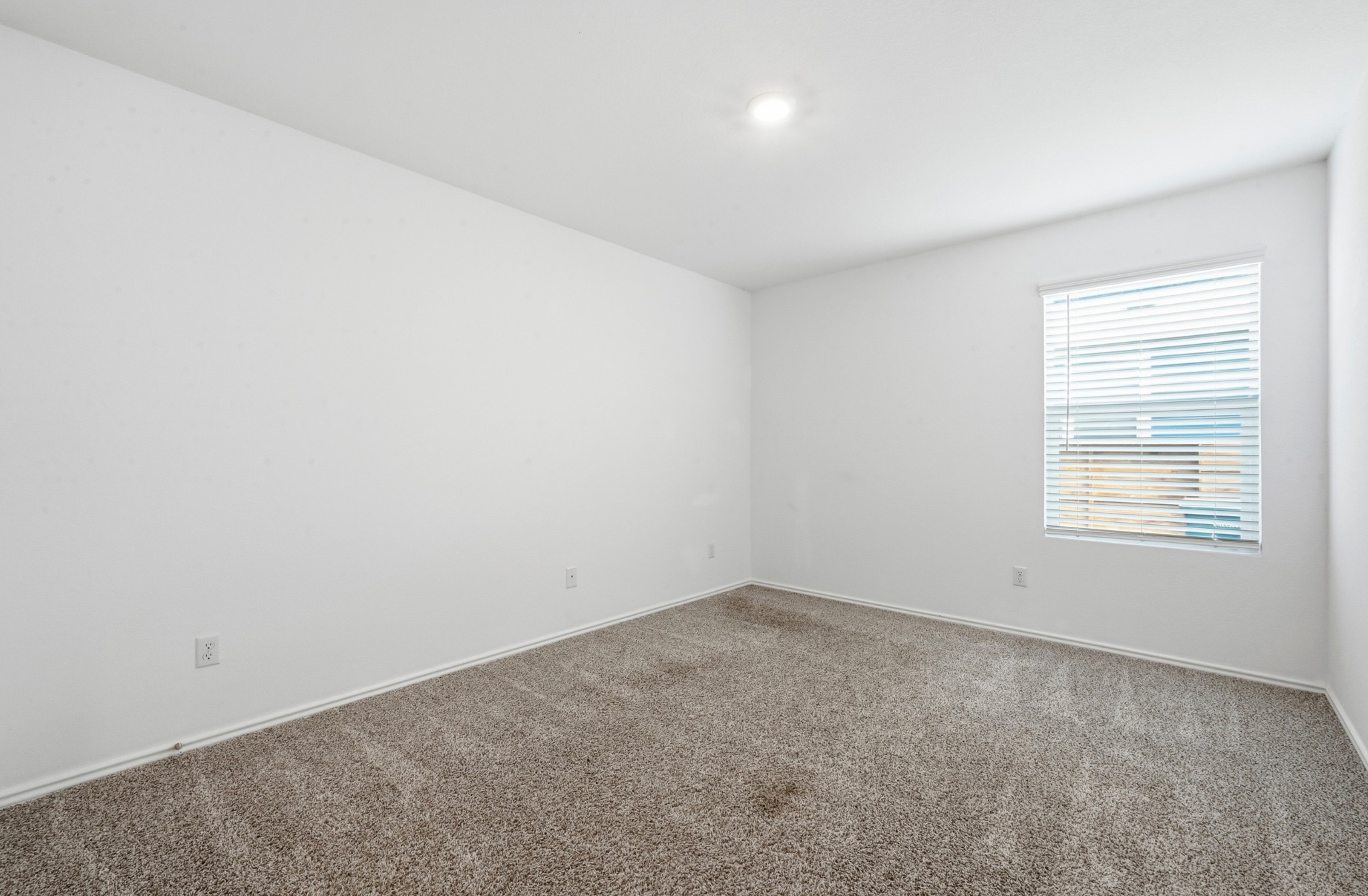 388 Barcelona Kyle, TX 78640 - Photo 19 of 26 an empty room with a window