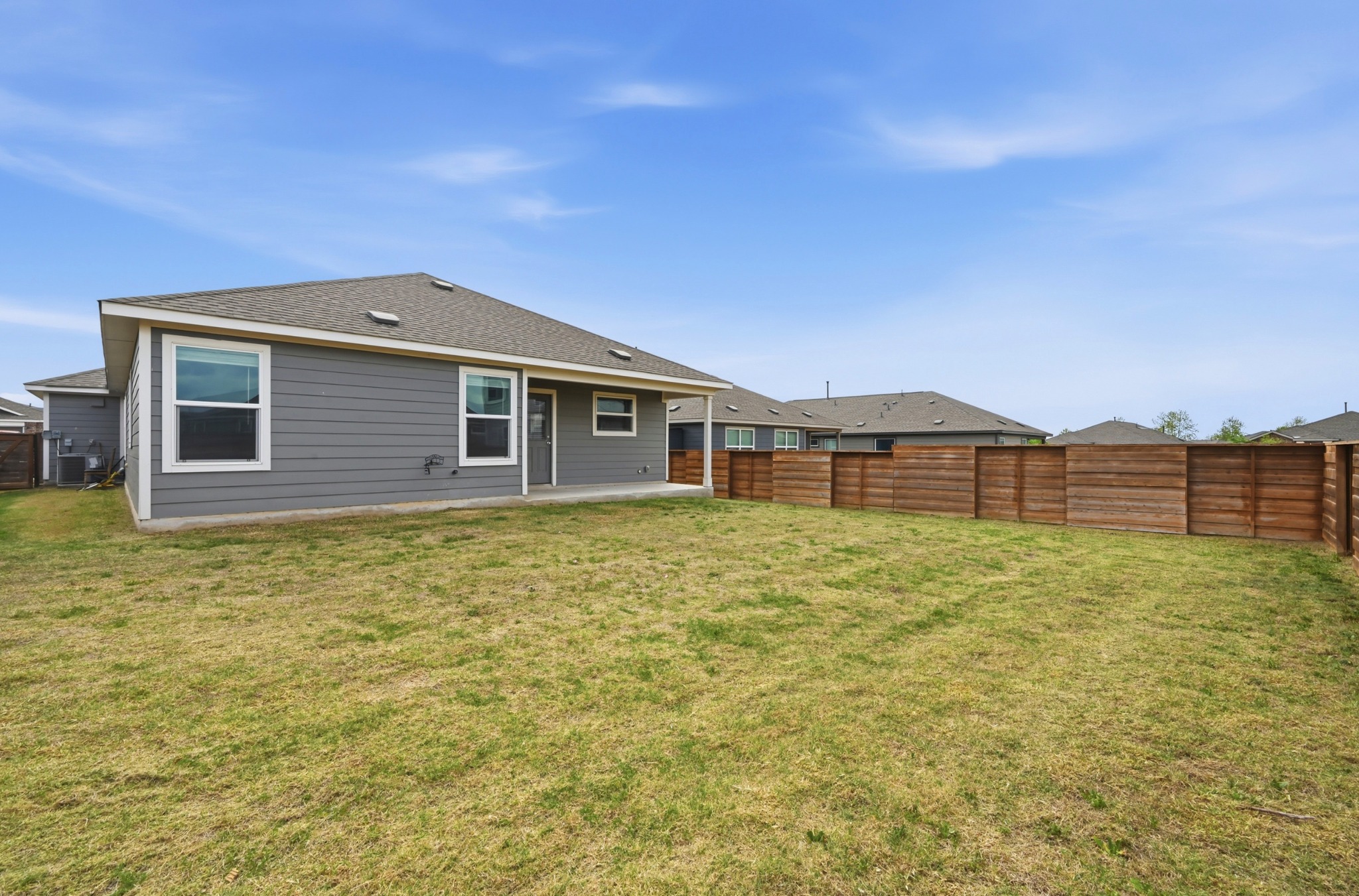 388 Barcelona Kyle, TX 78640 - Photo 23 of 26 a front view of a house with a garden