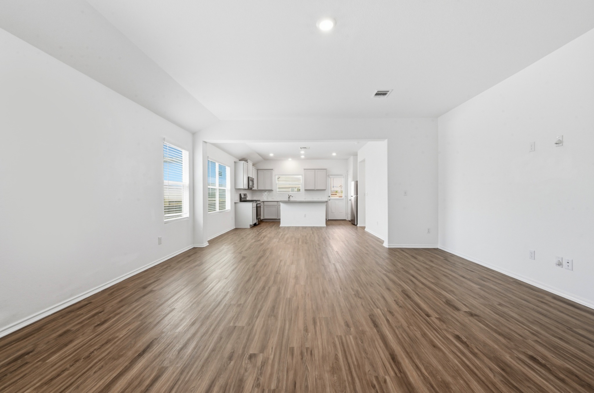 388 Barcelona Kyle, TX 78640 - Photo 25 of 26 a view of empty room with wooden floor