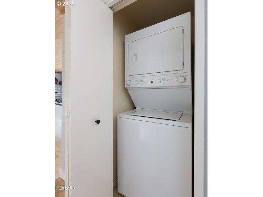 4175 Highway 101, Unit A1 Depoe Bay, OR 97341 - Photo 19 of 29 a utility room with dryer and washer