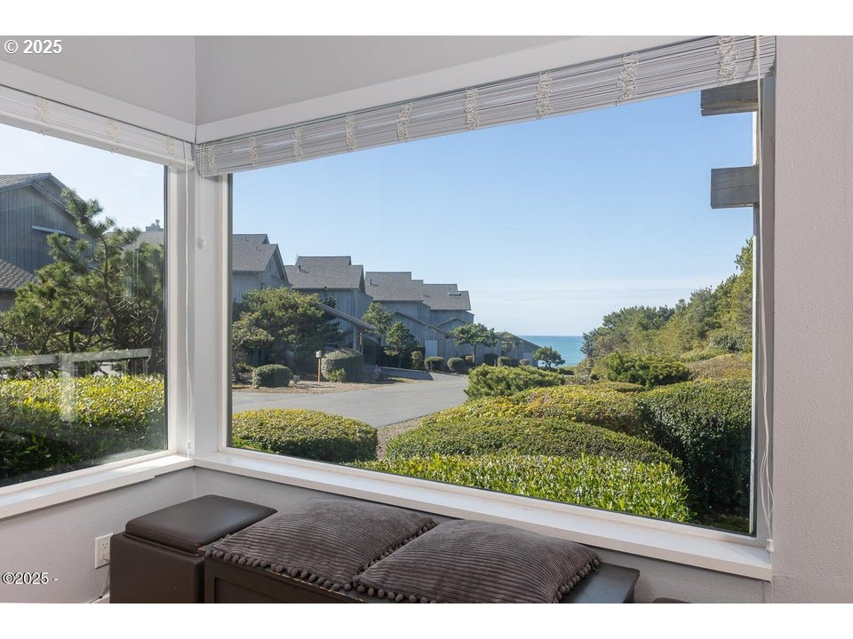 4175 Highway 101, Unit A1 Depoe Bay, OR 97341 - Photo 3 of 29 a view of a window and a floor to ceiling window