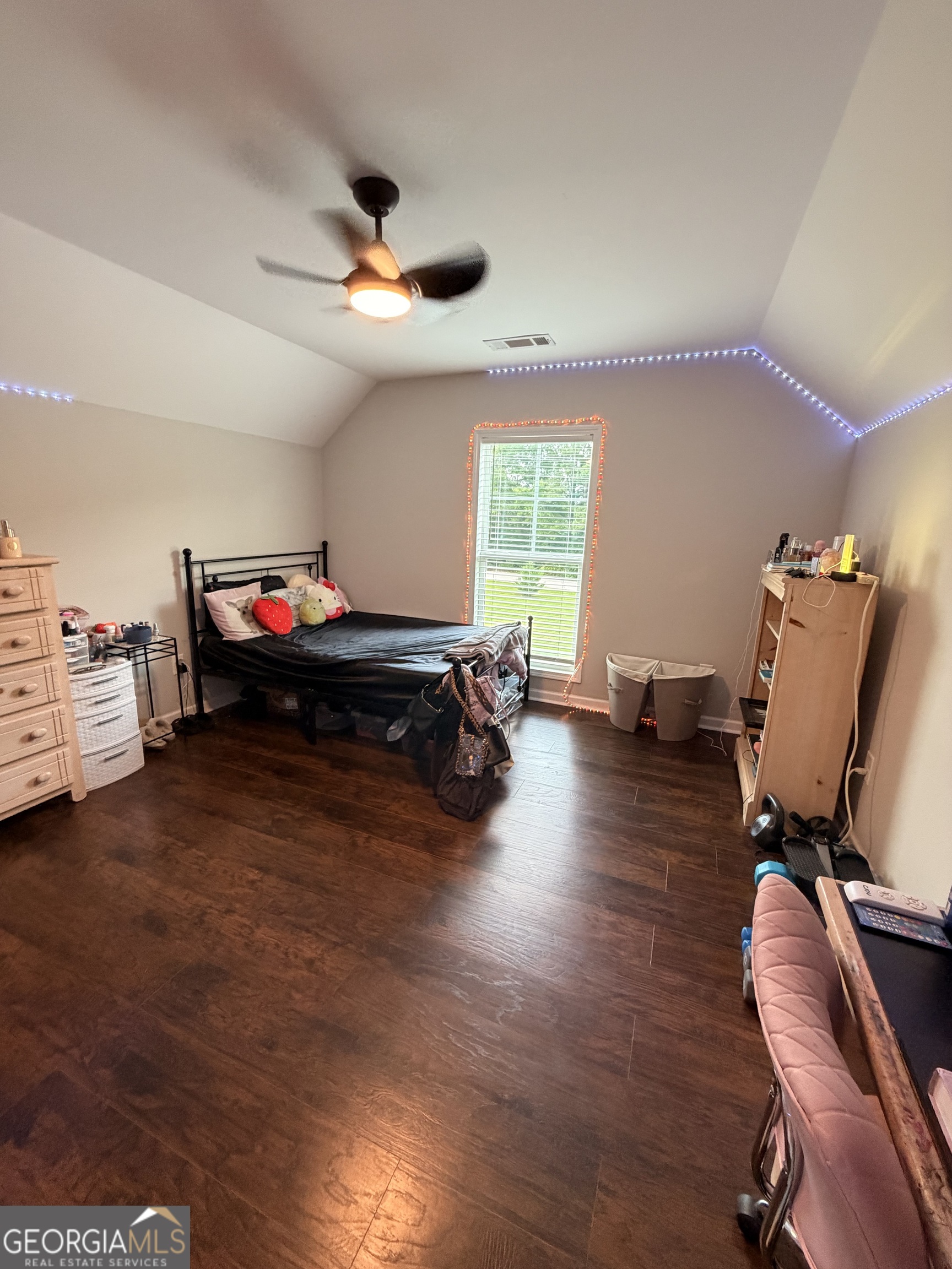 892 Perimeter Road Monticello, GA 31064 - Photo 21 of 38 a living room with furniture and a wooden floor