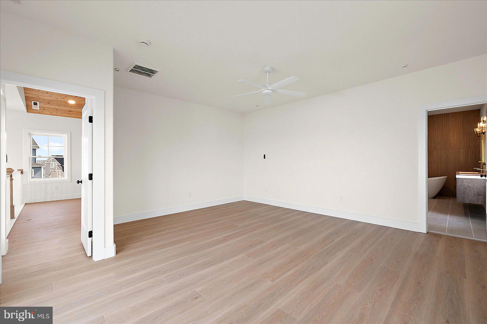12971 Inlet Isle Lane Ocean City, MD 21842 - Photo 52 of 134 Primary Bedroom with ceiling fan