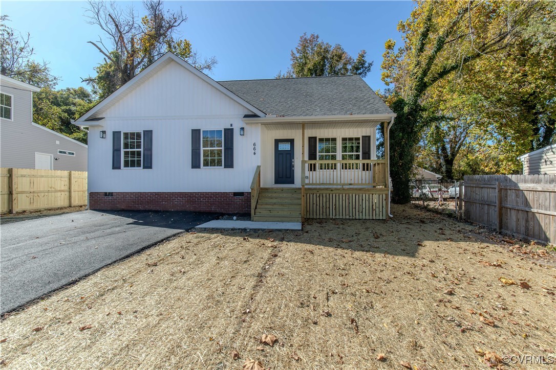 25610 Surry Avenue Petersburg, VA 23803 - Photo 1 of 20 View of front facade featuring crawl space, covere