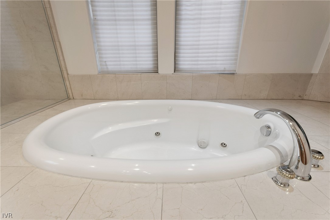 1057 Sawmill Road Incline Village, NV 89451 - Photo 26 of 48 Spacious primary suite features a spa-inspired ens
