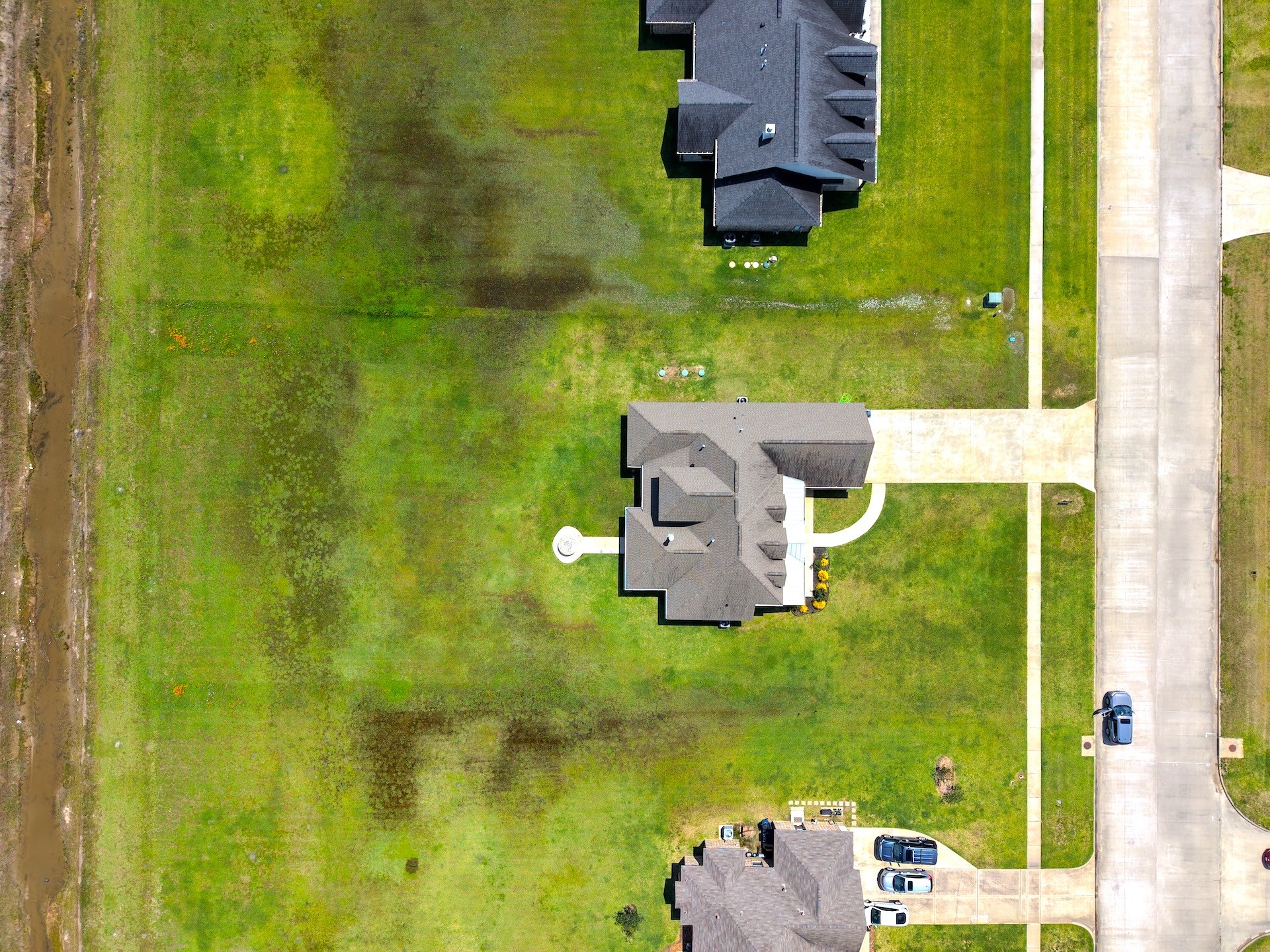 2295 Diamond D Lane Beaumont, TX 77713 - Photo 29 of 40 an aerial view of a house with a garden