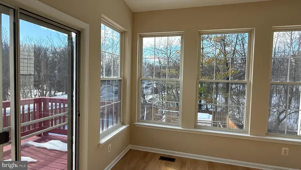 an empty room with windows