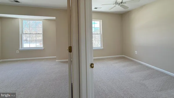 an empty room with windows
