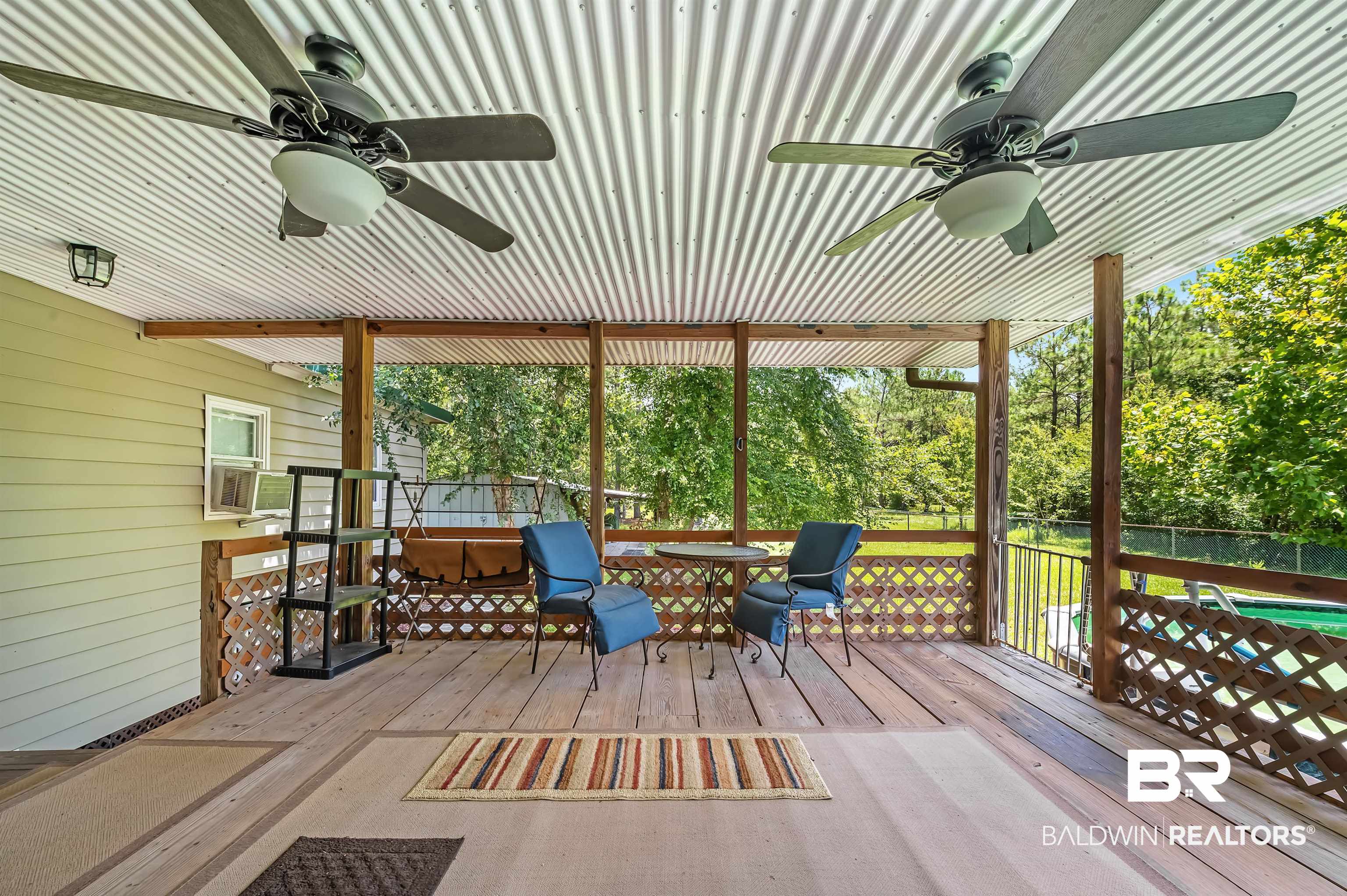 10970 Stucki Road Elberta, AL 36530 - Photo 11 of 56 Wooden deck featuring ceiling fan overlooking Pool