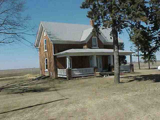 8282 North Baker Road Lena, IL 61048 - Photo 1 of 4 a view of a house with backyard and a tree