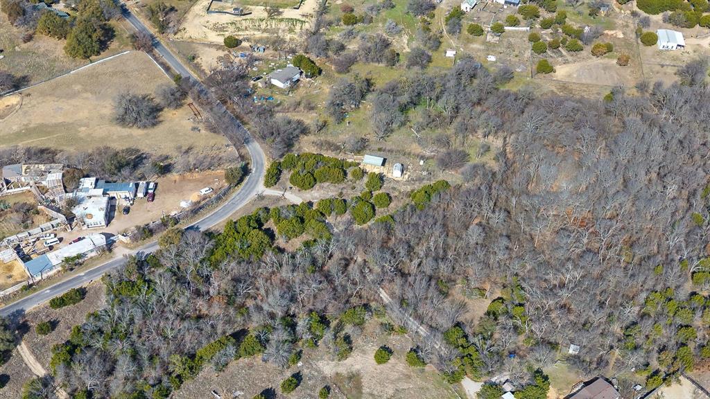 Tbd Yucca View Hurst, TX 76054 - Photo 9 of 12 a backyard of a house