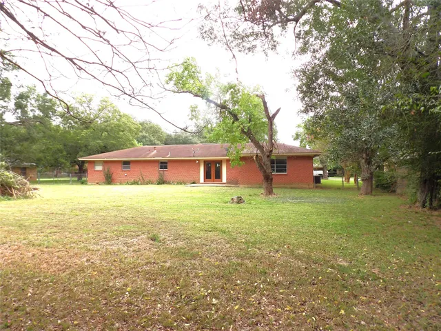 a fire hydrant in the middle of a field