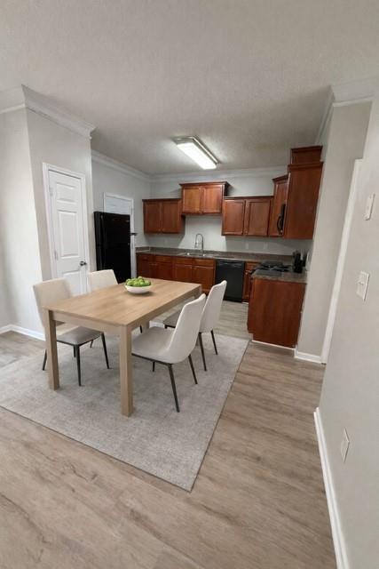 6370 Olmadison Place Atlanta, GA 30349 - Photo 7 of 15 a open kitchen with a table and chairs in it