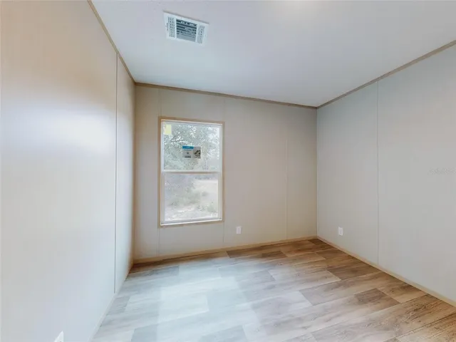 an empty room with windows