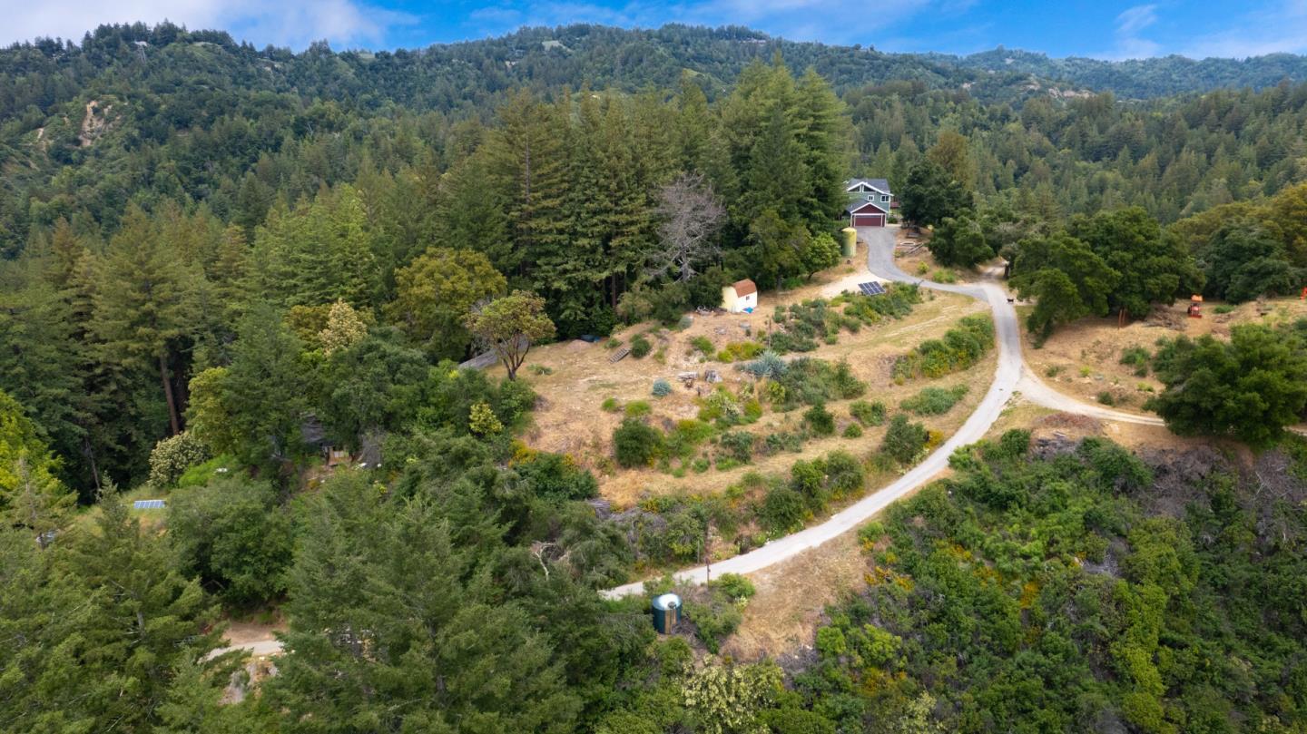 18060 Moonrise Road Boulder Creek, CA 95006 - Photo 5 of 31 a view of a forest with a lake