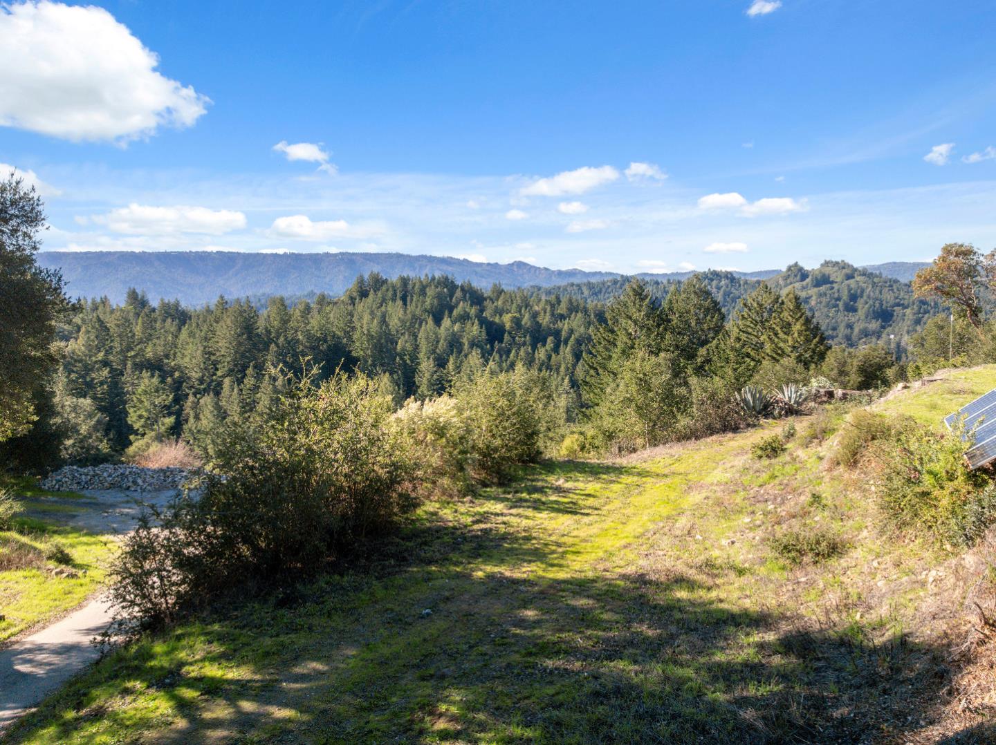 18060 Moonrise Road Boulder Creek, CA 95006 - Photo 9 of 31 a view of lake with mountain