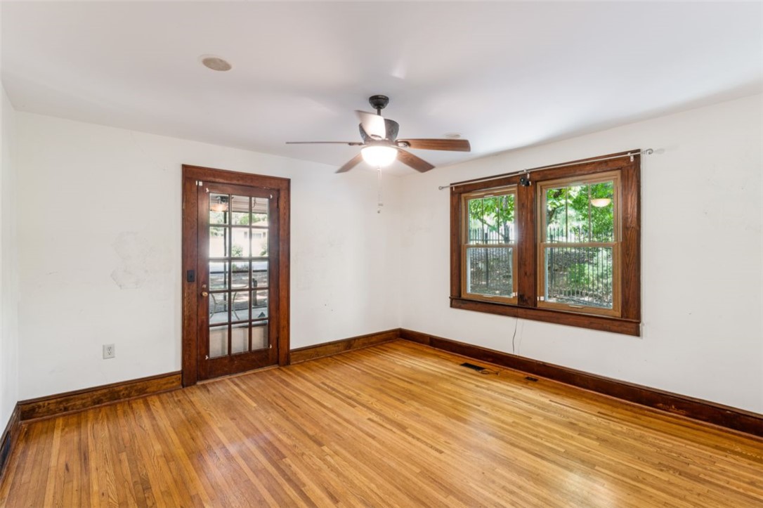 321 South Pine Street Walhalla, SC 29691 - Photo 30 of 32 Naturally illuminated interiors boast gleaming hardwood flooring and rich wooden trim accents.