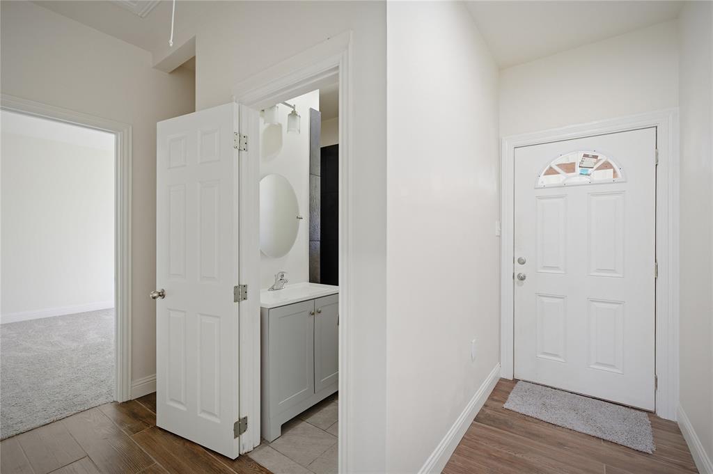 1905 South Walnut Street Sherman, TX 75090 - Photo 14 of 22 a view of a hallway with closet area