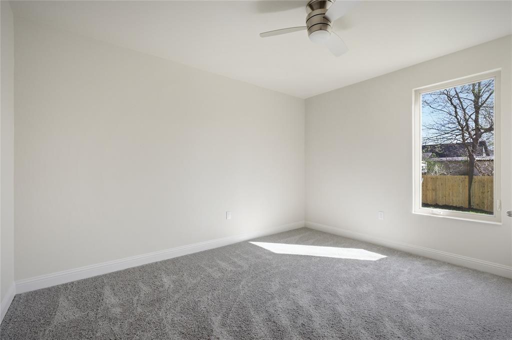 1905 South Walnut Street Sherman, TX 75090 - Photo 17 of 22 a view of an empty room with a window