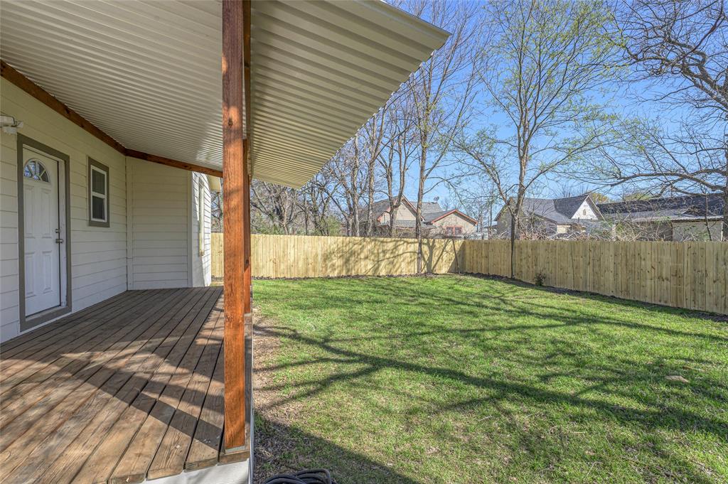 1905 South Walnut Street Sherman, TX 75090 - Photo 19 of 22 a view of back yard of the house