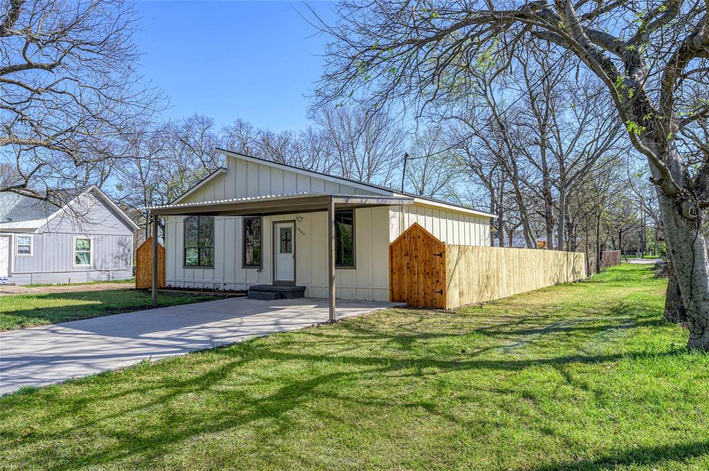 1905 South Walnut Street Sherman, TX 75090 - Photo 2 of 22 a view of a house with yard and tree s