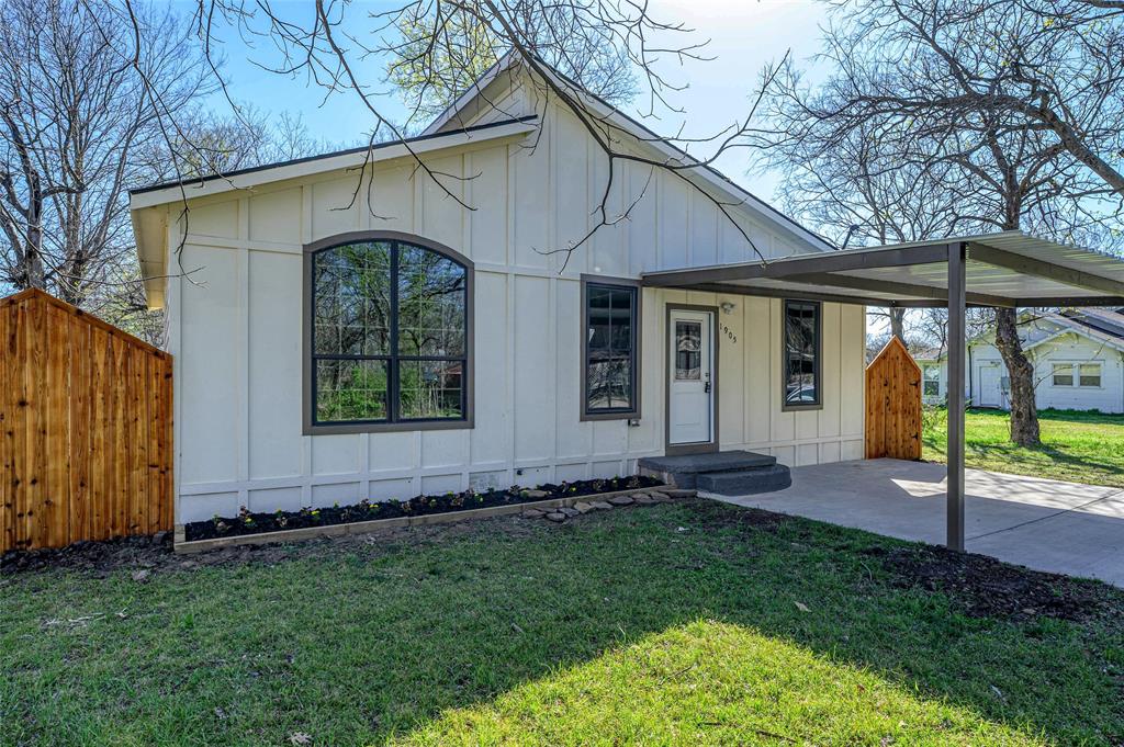 1905 South Walnut Street Sherman, TX 75090 - Photo 4 of 22 a view of a house with a yard