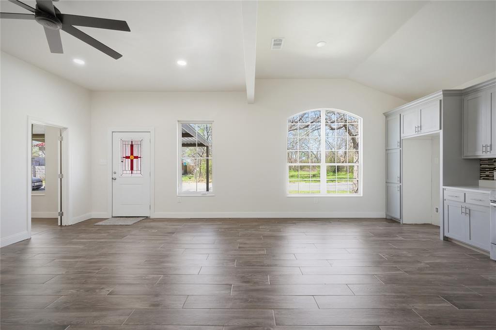 1905 South Walnut Street Sherman, TX 75090 - Photo 5 of 22 a view of livingroom with hardwood floor and a ceiling fan