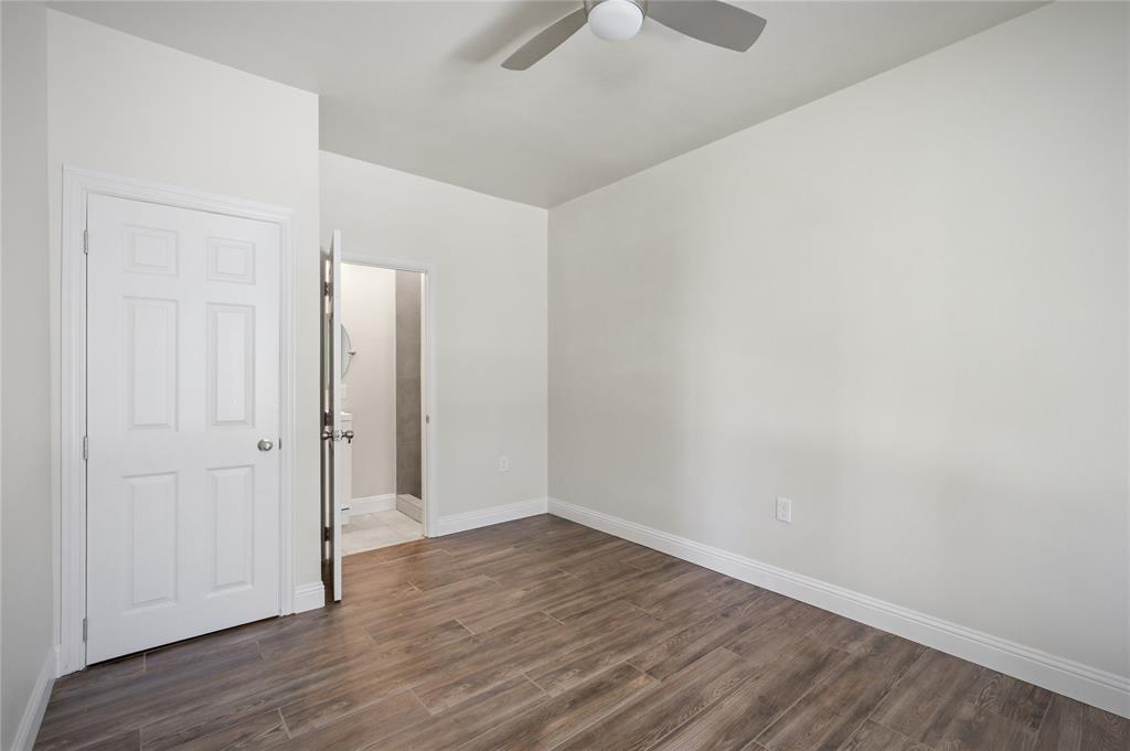 1905 South Walnut Street Sherman, TX 75090 - Photo 10 of 22 a view of an empty room with wooden floor