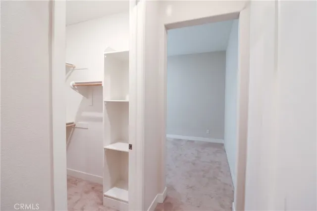 a view of a room that has a door in it