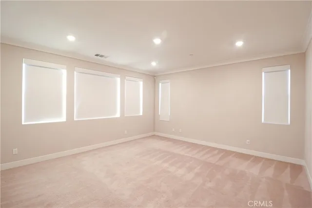 a spacious bathroom with a granite countertop sink a mirror and a bathtub