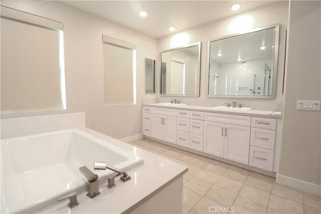 a view of an empty room with a dresser