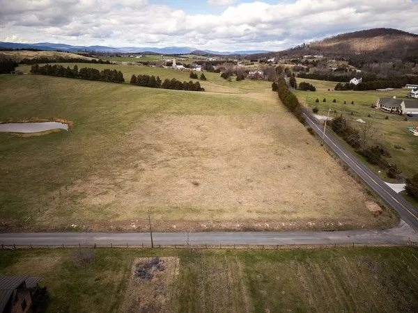 a view of a lake with a city view