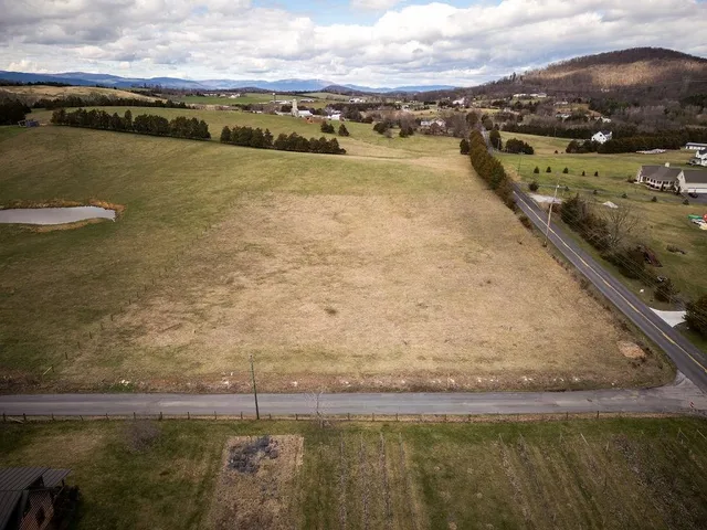 a view of a lake with a city view