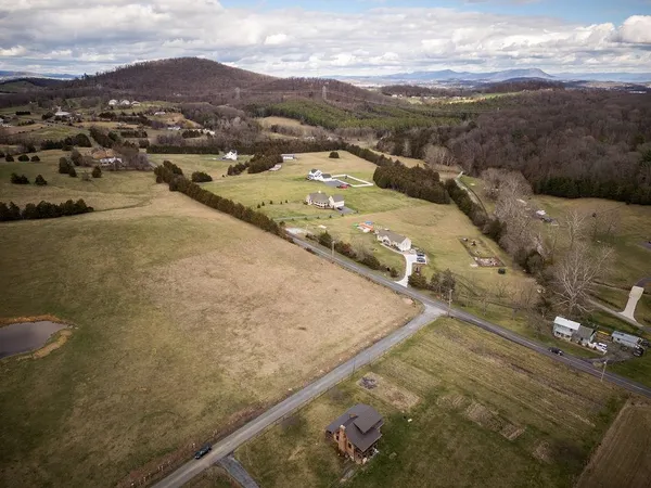 a view of a road with an ocean