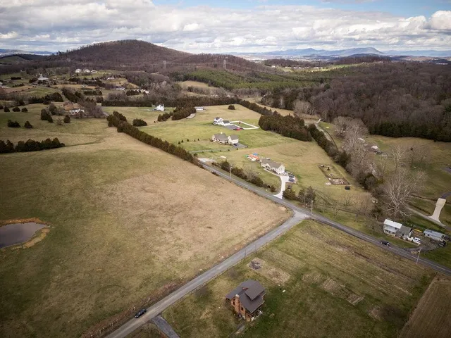 a view of a road with an ocean