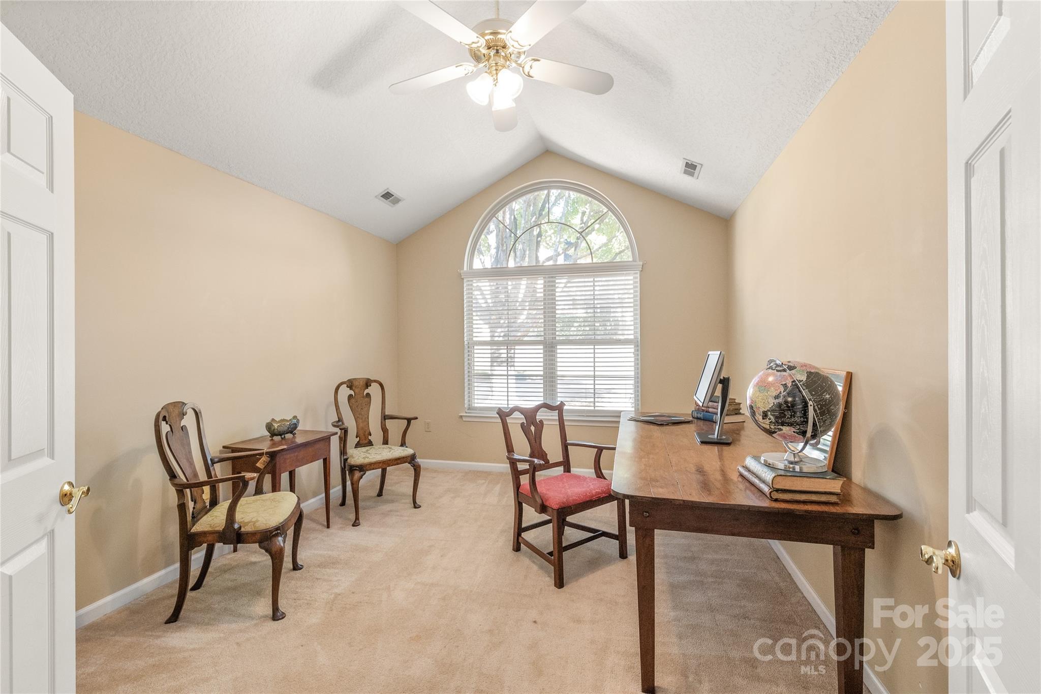 3052 Polo View Lane Matthews, NC 28105 - Photo 12 of 16 a view of a livingroom with furniture and a window