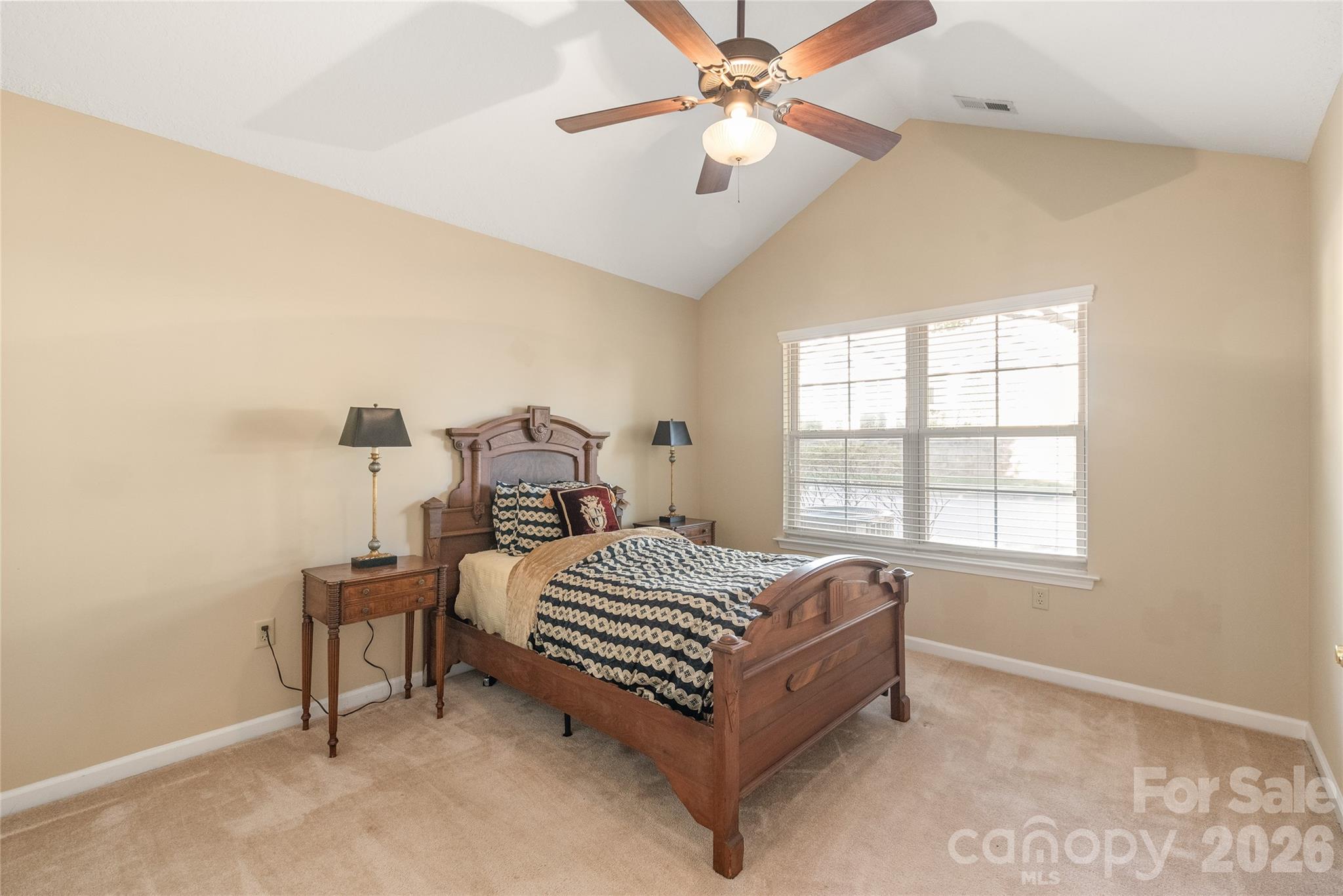 3052 Polo View Lane Matthews, NC 28105 - Photo 18 of 19 a bed room with a bed and a window