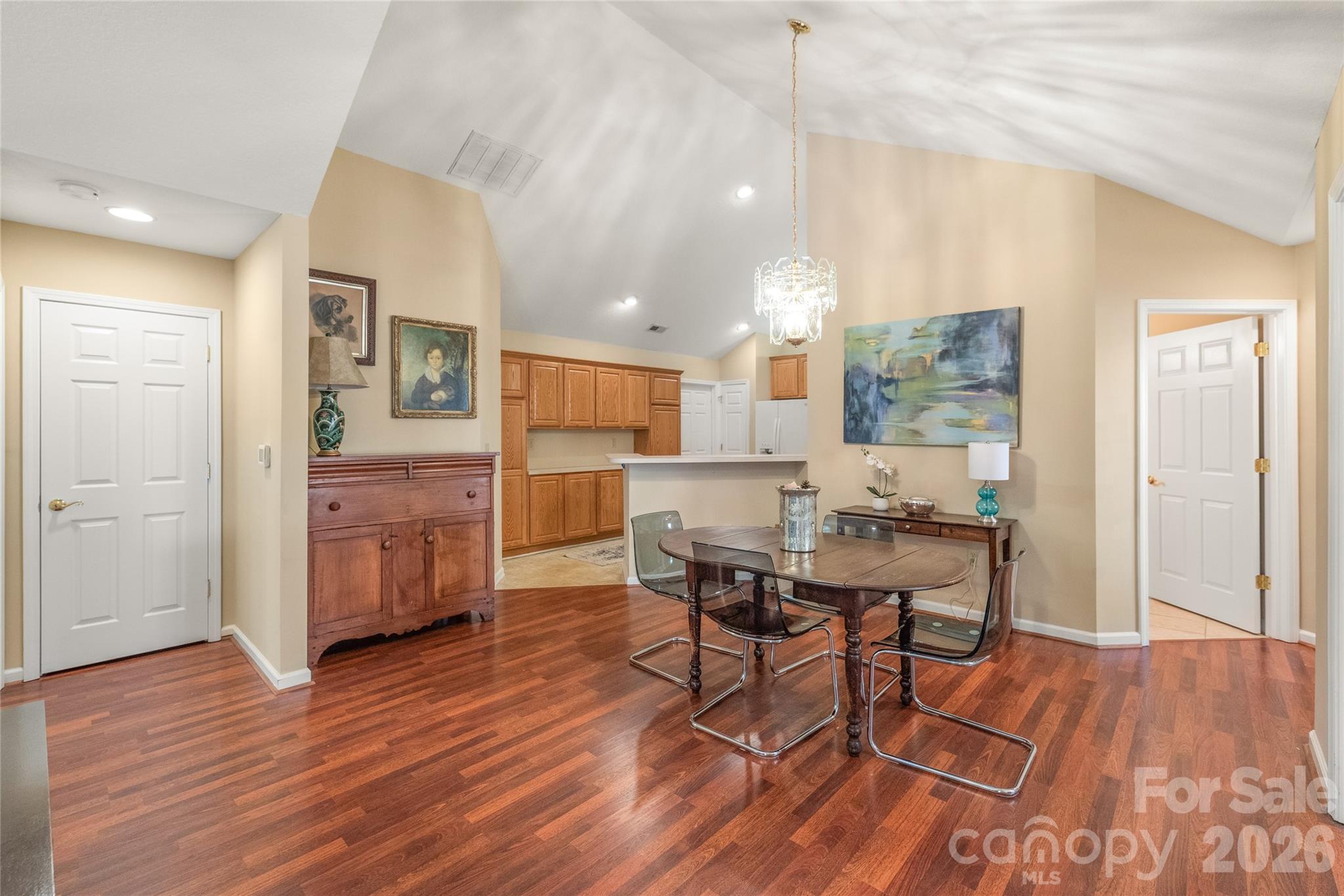 3052 Polo View Lane Matthews, NC 28105 - Photo 8 of 19 a dining room with furniture and wooden floor