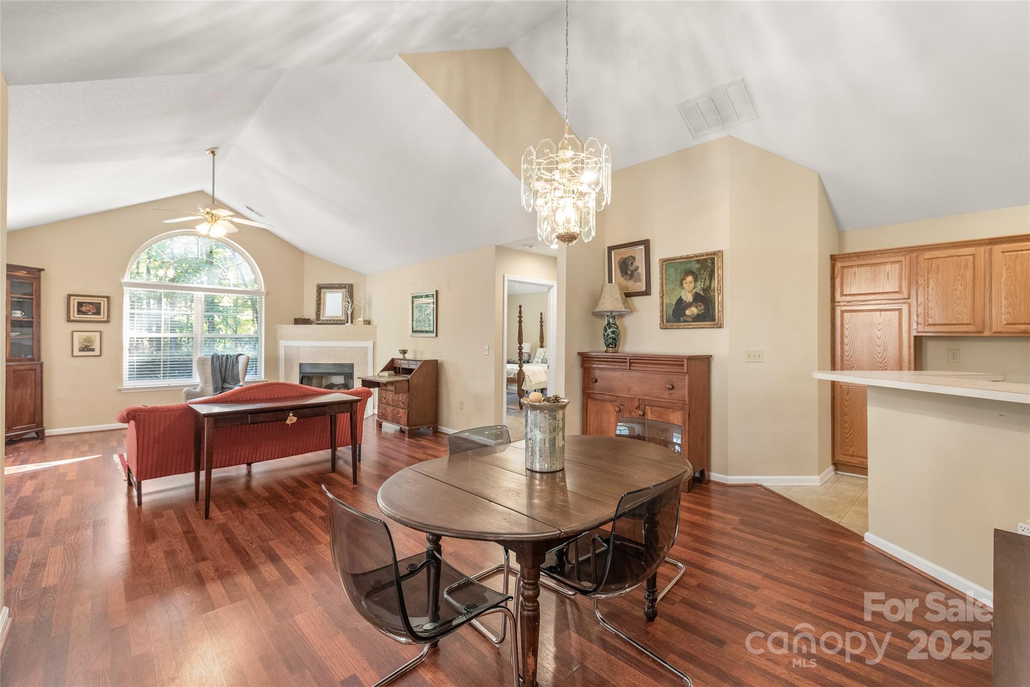 3052 Polo View Lane Matthews, NC 28105 - Photo 9 of 16 a view of a dining room with furniture window and wooden floor